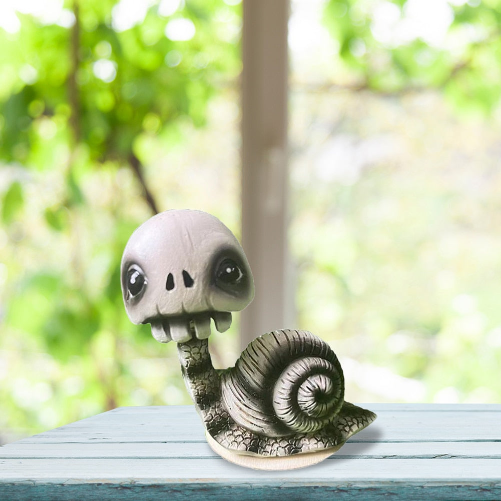 Snail Figurine Shaking Head Skull