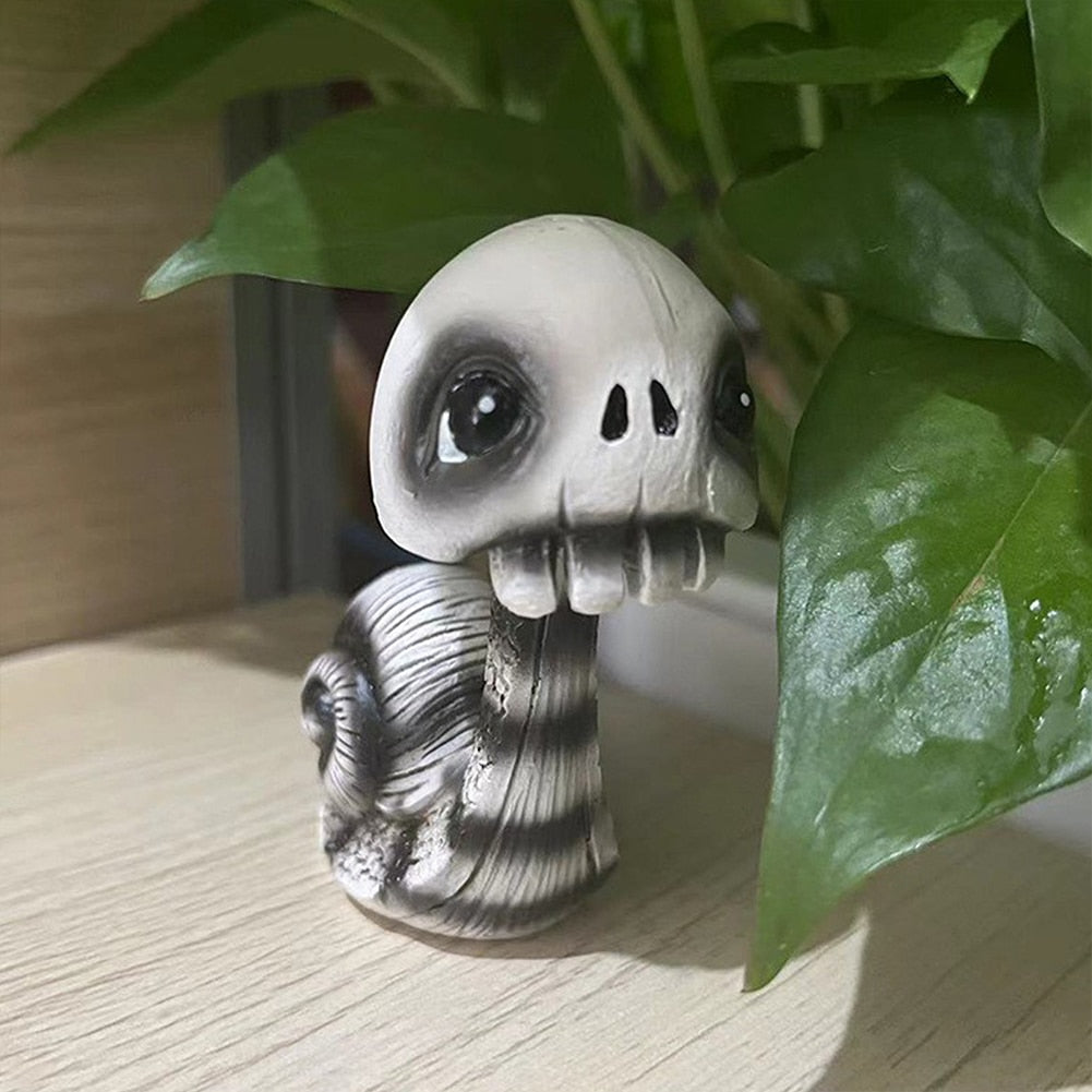 Snail Figurine Shaking Head Skull