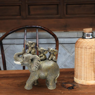 3 Baby Elephants Riding An Elephant Statue Figurine