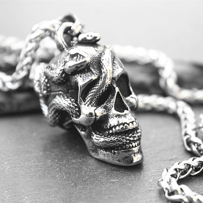 Twin Snake Wearing Skull Necklace